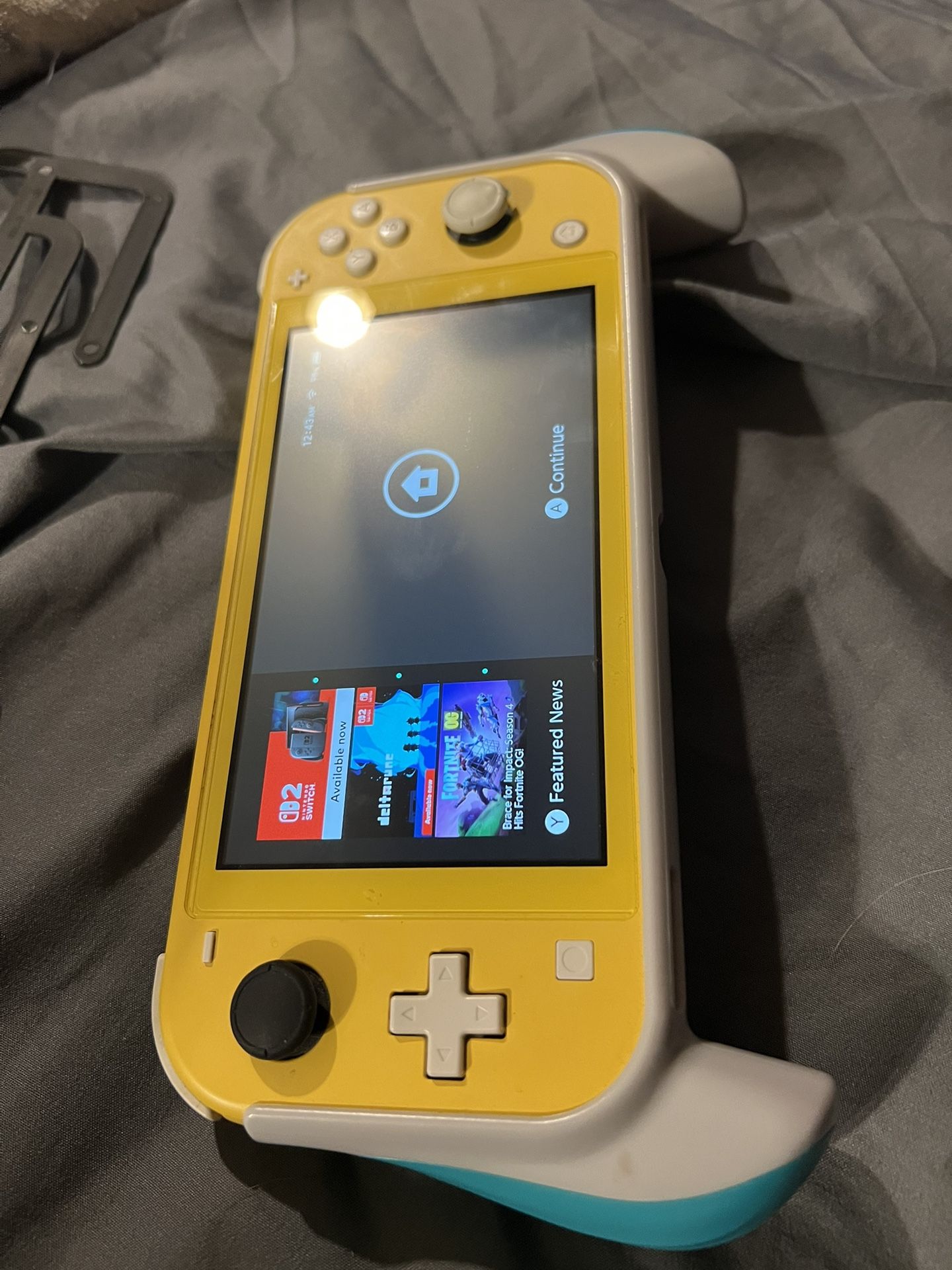 Nintendo Switch Lite With Handle Attachment