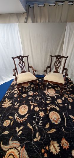 2 antique style dining chairs they are