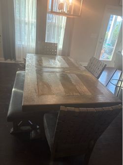 Farm house style dining room table with chairs and bench
