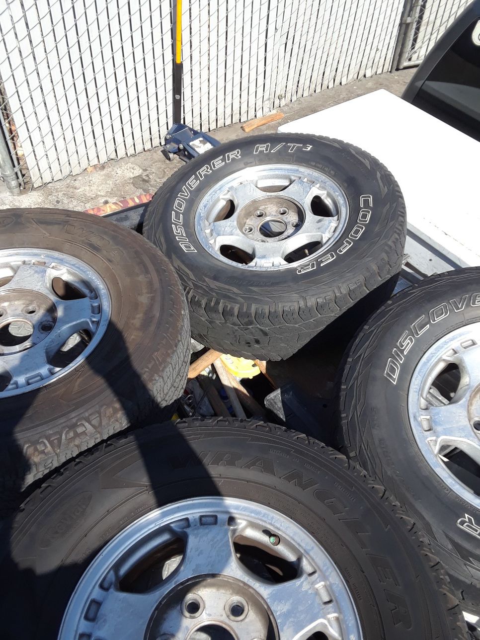 2000 Chevy Silverado tires and rims with caps