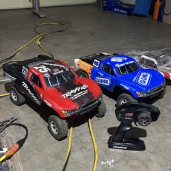 Two Traxxas Remote Control Cars