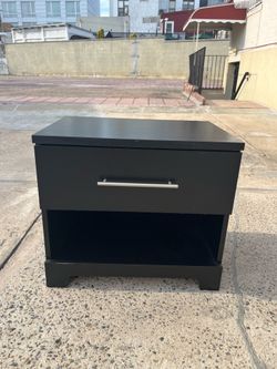 Black night stand with drawer