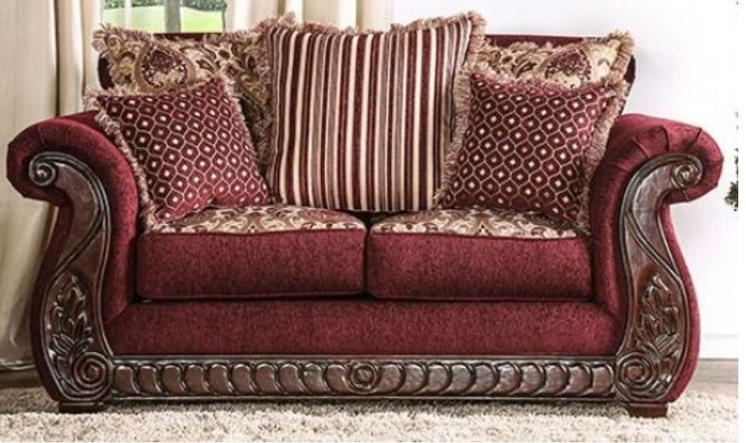 Red Couch With All Of The Pillows