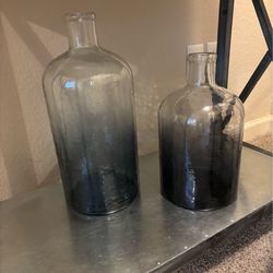 2 Modern Smoky Blue glass bottles I used on my marble coffee table