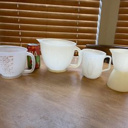 Tupperware Measuring Cups. 4 cup good shape $6. 8 cup with wear