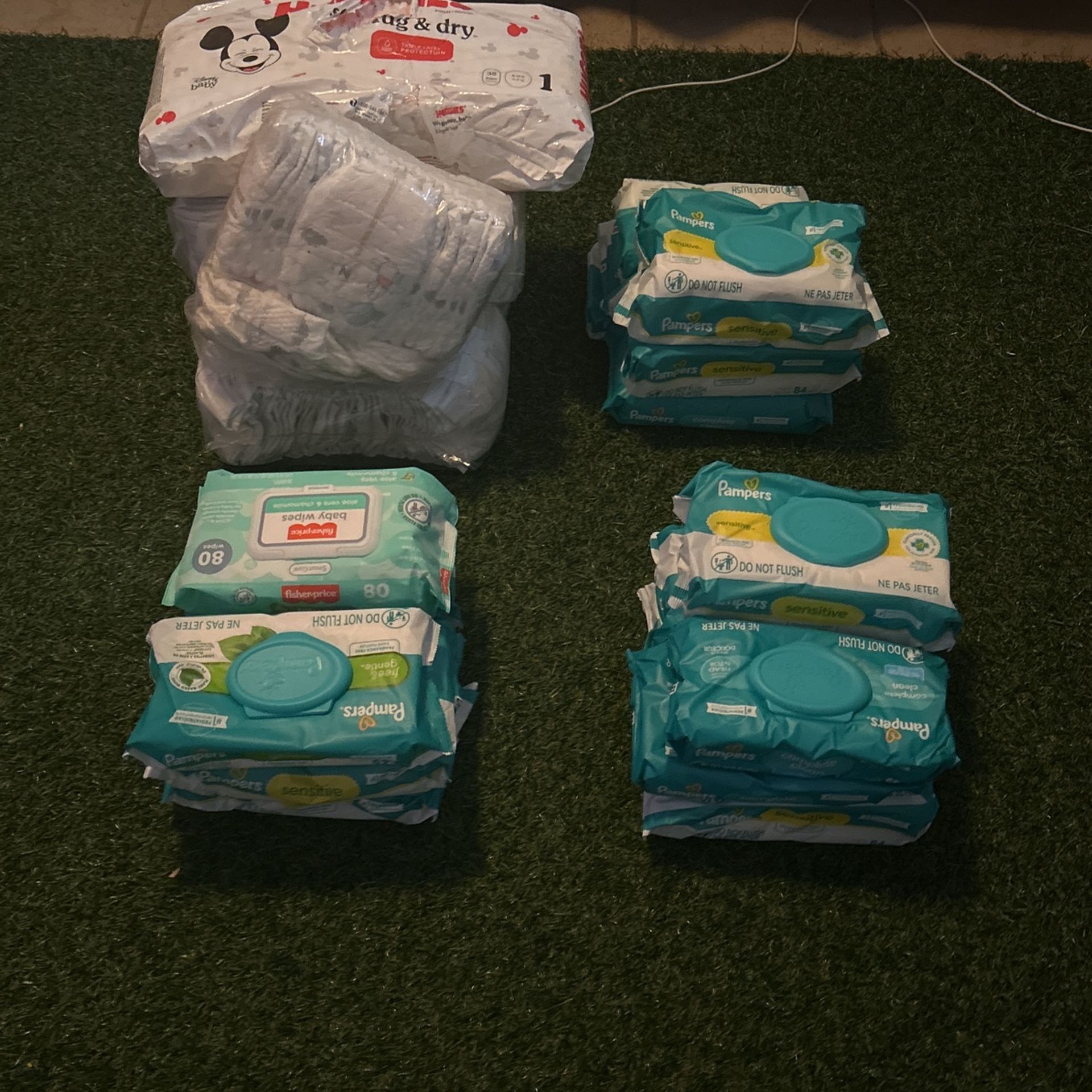 4 Bags Of Diapers & 18 Bags Of Wipes