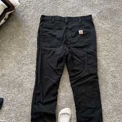 Men’s Carhartt black pants 34/32 no faded