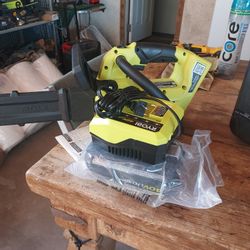 40V HP Brushless
12 in. Top Handle
Battery Chainsaw
with 4.0 Battery
and Charger