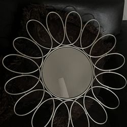 Mirror with metal frame