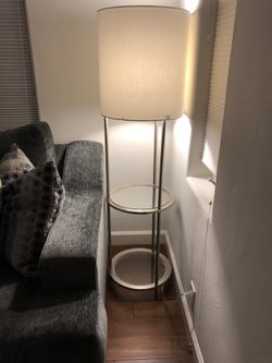 New floor glass and silver lamp