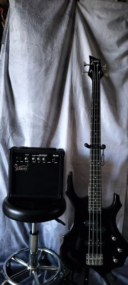 My art design. Brand new full size electric bass with 20 watts amplifier gig bag cable and shoulder strap