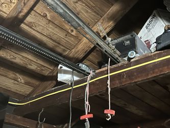 two Garage Door Openers. $60 For Both