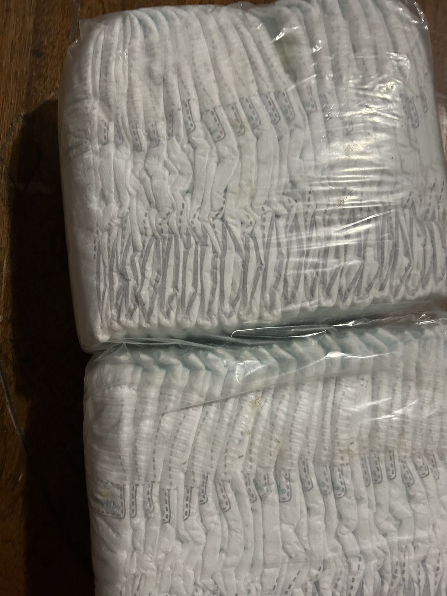Comforts Size 7 , Pampers Size 2