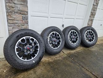 Brand new toyota tacoma trd offroad wheels and tires.