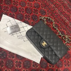 Chanel “Mini Square” Bag
