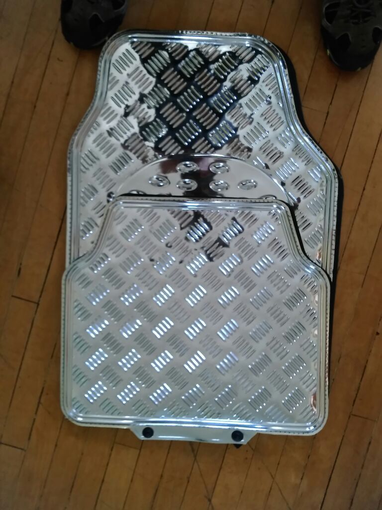 Chrome floor mat's. New $25