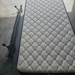 Like new twin Bed by sleepys + bedding