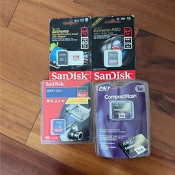 SanDisk Lot 1GB, 4GB, (2)64GB Cards NEW IN PACKS