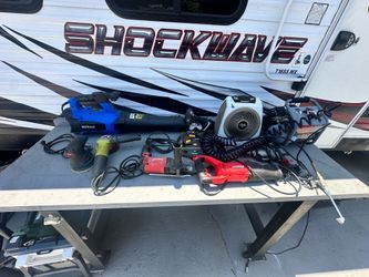 Bunch of tools. Compressor sawzal grinder, drills blower.