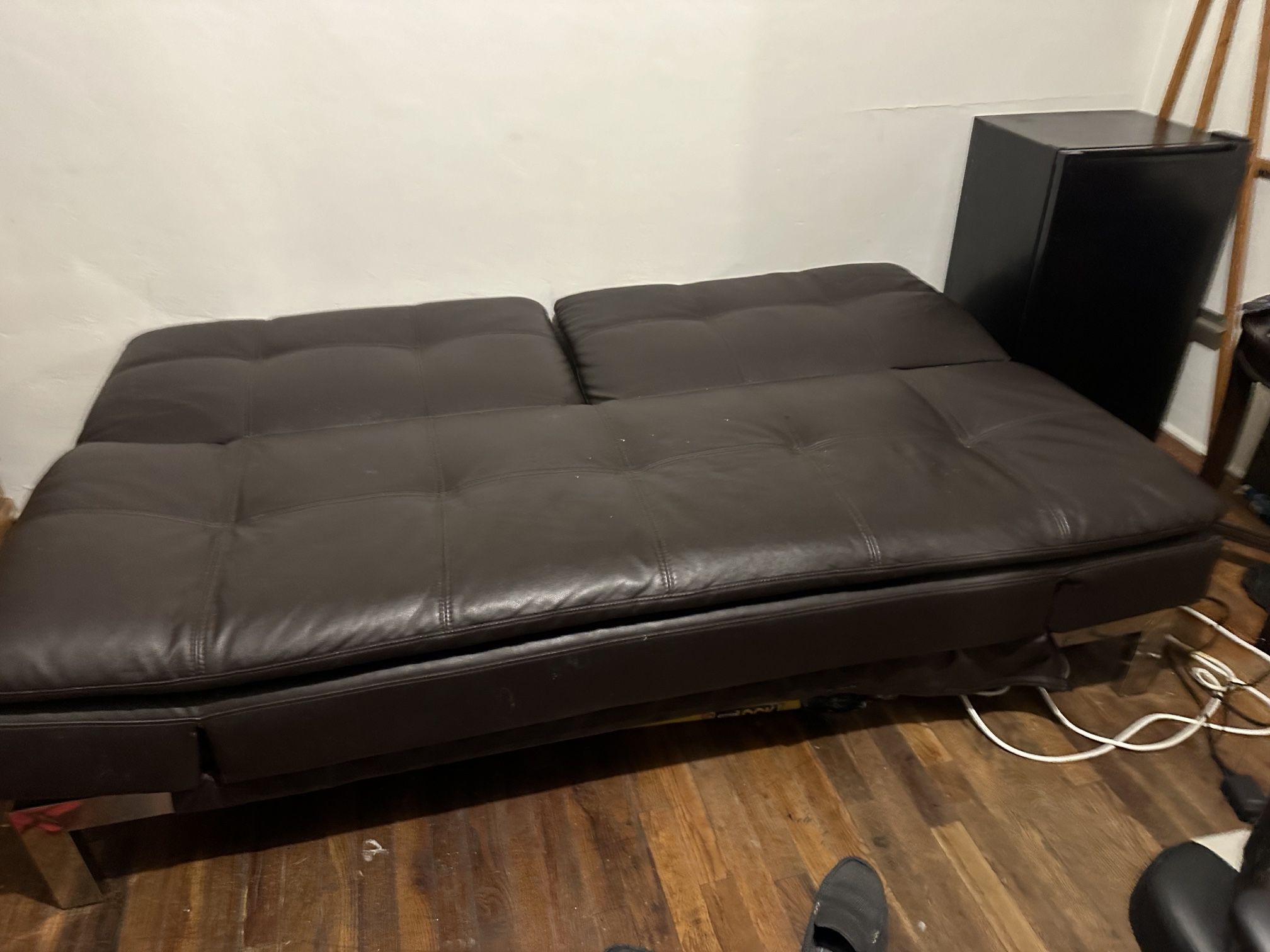 Leather Couch /bed. $400