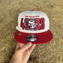 Cream and red San Francisco 49ers New Era snapback hat; brand new, never worn, perfect condition