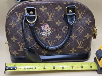 Authentic Louis Vuitton My LV World Tour Alma BB handbag Entrupy Certified.
