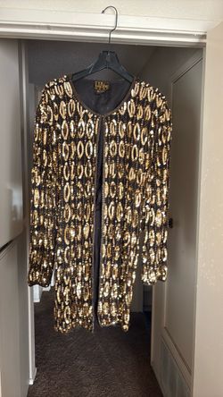 Women's black and gold holiday jacket