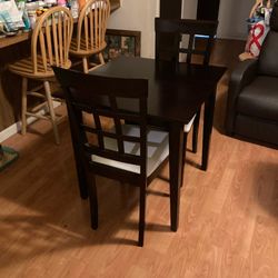 Elegant mahogany table and chairs.
