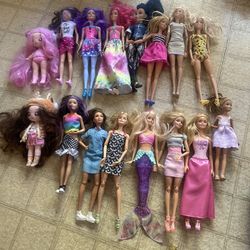 16 Barbie Dolls 