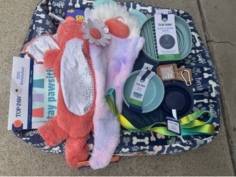 New unused dog bed and bowls and toys