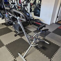 Sunny Health & Fitness Row-N-Ride Squat Machine
