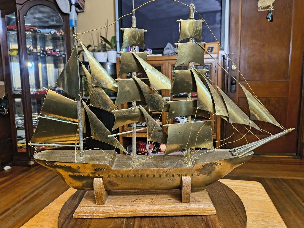 Solid Brass Boat. The dimensions are 19x15