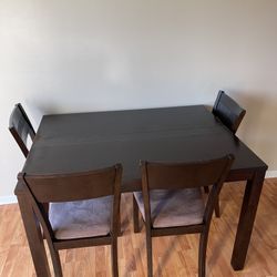 Kitchen table and four chairs(Make me A Deal )no Low Balls