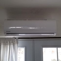 Heating cooling minit split unit