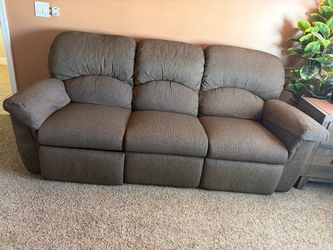 Reclining color brown Sofa.