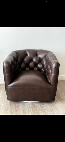 Brown leather swivel chair