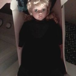 Brand New Porcelain Doll In Box ..