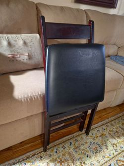 Folding Chair with Black Padded Seat