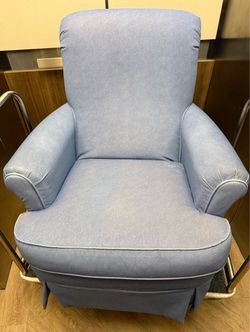 Light blue swivel rocker chair
