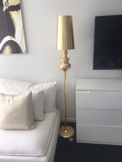FLOOR LAMP .NEW IN BOX .. Available in gold or silver