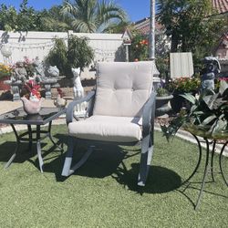 White Metal Rocking Chair With Cushion And Side Table