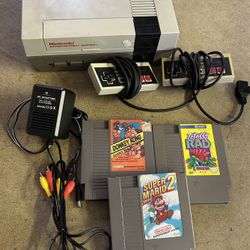 original Nintendo entertainment System NES not working with 2 controllers, cords, and 3 games