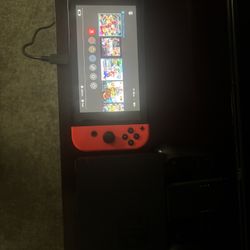 Nintendo Switch With Mario Kart And Mario Wonder
