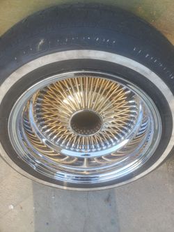 14x7 gold center wire wheels rollers