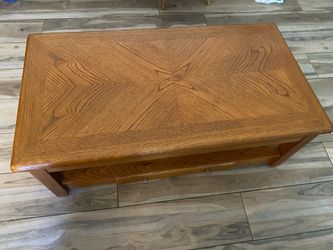 Coffee table that opens up