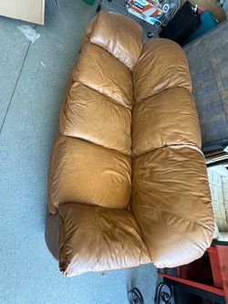 Leather couch and Ottoman