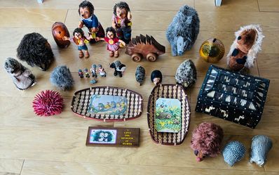Porcupine Collection of figures-ceramic, metal, stuffed, wood, clothed people, etc., with quill box.