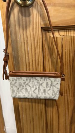 MK small shoulder bag 7”x 4”, belt length is adjustable 25” to 27”