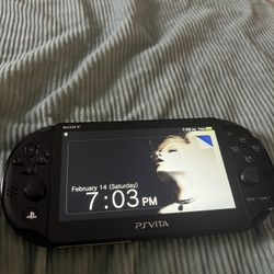 PSVita Slim Model W/PSvita SD Adapter and SD Card