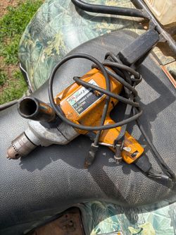 Black and Decker 1/2” variable speed drill.